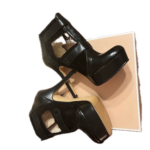 Michael Kors patent leather platform heels. Buckles and ankle height. 
Size 7M - Picture 2 of 16